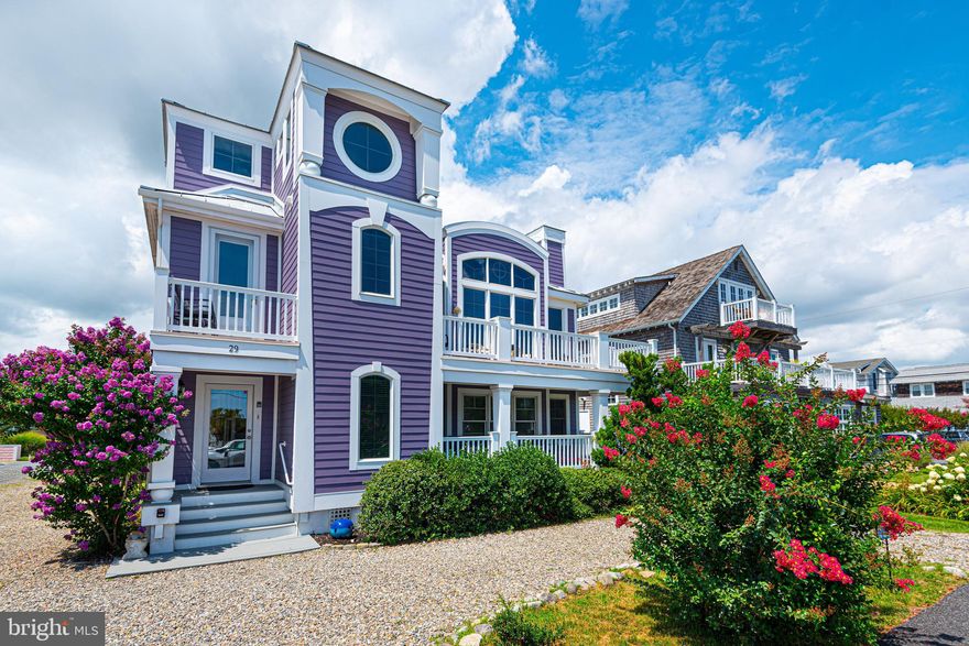 Ocean block! Just steps to the beautiful Atlantic Ocean and 3 short blocks from the center of town. The “Purple House” on Atlantic Ave offers amazing ocean views, is architecturally sophisticated and the attention to detail throughout the house is unquestionable and impressive. This wonderful retreat offers 7 bedrooms, 6.5 bathrooms, den, open floor plan, gourmet kitchen with breakfast bar and, wine refrigerator, dining area, living room with gas fireplace, laundry room with and under counter beverage fridge, multiple decks, outside shower and plenty of parking. Enjoy all the attractions that Bethany has to offer, free summer concerts, shopping, and dining. Successful rental.