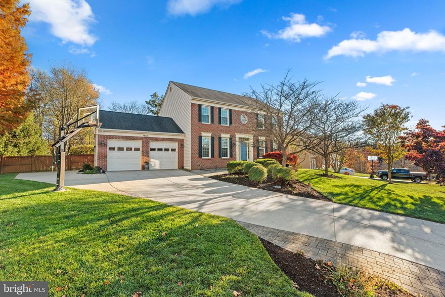 EXCELLENT CONDITION -- PREMIUM YARD -- MUST SEE! Welcome to 10516 Bill Lilly Ct; A stunning brick-front colonial in Laurel, MD - Pristine condition, magnificent landscaping, Howard County schools, and an exceptional private lot! Enjoy the convenience and value of being just moments from the best shopping, dining, and entertainment options in Maple Lawn. This home is perfectly positioned for quick access to major commuter routes including I-95, Route 29, and the ICC (Intercounty Connector), making commuting to Baltimore, Washington D.C., Annapolis, and surrounding areas simple and efficient. Bill Lilly Ct is a non-through street lined with beautiful, well-maintained homes and yards. **EXTERIOR HIGHLIGHTS** -- Tons of parking w/ massive driveway, additional paved area added next to garage -- Two car, front load garage w/ additional storage -- Side pedestrian door off garage -- Two keypads for garage entry -- Permanent basketball hoop -- Exterior illumination system -- Flagstone walkway/entry -- .46 Acre lot, flat/cleared backyard, fully fenced in rear w/ interior garden fence -- New storage shed -- Professional landscaping; fresh mulch, new privacy trees, curved garden beds, mature/diverse species, professional drainage in rear yard -- Large deck w/ automatic retractable awning -- Brick front -- Architectural shingle roof -- Solar panels -- Gorgeous curb appeal -- Personal mailbox. **INTERIOR HIGHLIGHTS** -- Exceptional floor plan; two story foyer, separate dining area, kitchen connects to living area, breakfast nook, modern colonial layout, space for home office, home gym, multiple entertainment spaces --  High ceilings -- Georgian-style floor to ceiling windows -- Wood, LVP, tile, and carpet in excellent condition -- Crown molding -- Updated light fixtures -- Updated bathrooms -- New gas fireplace -- Built-ins -- Primary suite w/ vaulted ceilings, walk-in closet, jetted tub, seated shower, wood floors -- Finished basement w/ bonus bedroom, built-ins, office space, full bathroom, workshop, play area, and tons of storage. -- Main level washer/dryer w/ additional hookups in basement, as desired -- Wine storage -- Mudroom/transition area. **KEY CAPITAL COMPONENTS** Roof, windows, HVAC, water heater, appliances, flooring, foundation, and deck are all in excellent condition. This home has been expertly maintained and updated. This is a move-in ready option that can be delivered quickly depending on the buyer's preferred timeline for sale.