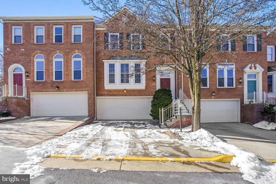 Exceptional three level townhome in the heart of Tysons just one-half mile to the silver line Metro Station, and just minutes to 66 and 495 with a two-car garage and two private outdoor spaces. The home has hardwood flooring throughout with updated bathrooms, a chef's kitchen with granite counter tops, island, high-end stainless-steel appliances, lots of cabinetry, pantry, and built-in desk. Gas fireplaces in the living room and master bedroom. Two bedrooms upstairs with ensuite bathrooms, and laundry on this level as well. Fully finished walk-out basement with full bathroom and access to the garage.