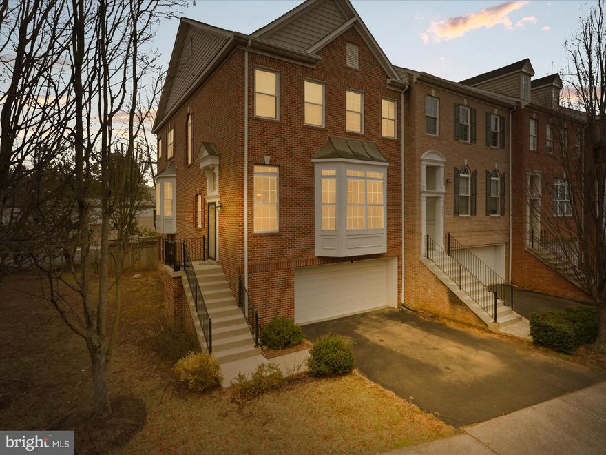 ***Welcome to 2929 Saxon Flowers Dr, nestled in Fairfax Virginia. Best Value in town for a luxury 3 level End-Unit Townhome in heart of Fairfax with stunning interiors, premium wooded lot and Just minutes from Mosaic District! **Move-in ready, Bright and almost 2700 sq ft charming Home** This home features open concept floor plan with 4 bedrooms, 2 full bath, 1 half bath. Major upgrades includes :  Porcelain flooring in the kitchen & family room (2022); Vinyl flooring in upper level and stairs (2023); All bathrooms (2022); Roof (2018), HVAC & water heater (2022), Fridge (2020), Dishwasher (2022), Washing Machine (2018), 
Deck (2017), Patio Door (2022); Garage door (2020). A bright foyer with modern fixtures welcomes you into the home. The main level open floor plan (10 ft ceilings!) flows seamlessly through the living room into the formal dining room and family room/kitchen. The kitchen features ample cabinetry, Granite countertops, updated s/s appliances, and a dedicated pantry **Large 2x4 ft modern floor tile in the living room/kitchen. **Custom high-quality blinds on the main level** Access the large Trex deck overlooking private wooded views. New wide plank LVP Floors covers entire upper level. Upstairs, the spacious master bedroom includes tray ceiling, walk-in closet, and full build-in wall mirror. The fully updated bathroom features a dual vanity and a jacuzzi tub, with a separate room for shower stall and toilet. Two additional, spacious bedrooms both include statement walls and share a full bath. Convenient laundry closet on upper level with full-sized W/D. Downstairs, finished lower level features a room and built in entertainment closet. Lower level great for in-law suites, dual home offices or entertainment. Walk out to the concrete covered patio and fenced-in backyard for privacy. Basement access to the 2-car garage from the lower level that accommodates plenty of storage space. Two additional parking spots in the driveway. Walking distance to Fairhill Elementary School (2 min) and Armistead Park Trail (5 min), which leads to Armistead Park. Less than 5-minute drive to Mosaic District! 1 mile radius to Vienna Metro/Dunn Loring station. INOVA Fairfax Hospital, Nottaway Park. Convenient commuter location minutes to I-66, US-29/Lee Hwy, US-50, I-495. Hop on the metro at Vienna Metro (Orange Line/4 min drive) or Dunn Loring Metro (Orange Line/5-min drive). 12 min to Tysons Corner! Less than 30 min drive to downtown DC. Don't miss out on this townhome that lives like a single-family home!