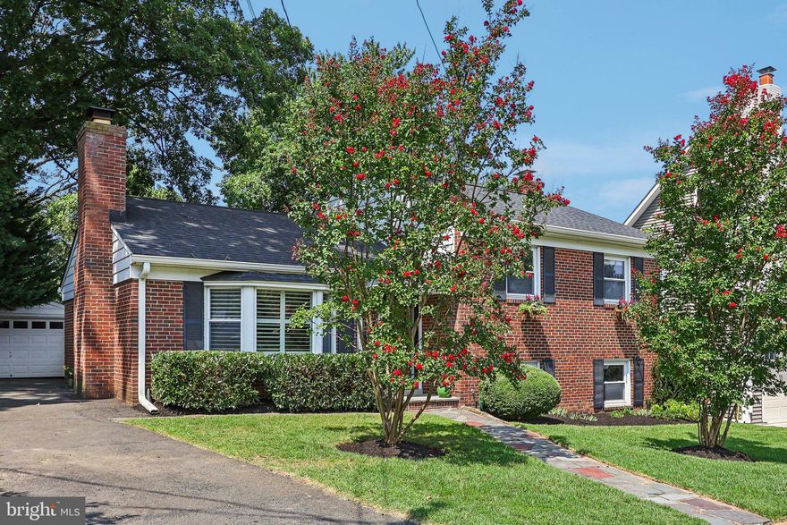 Metro Convenient Charmer! Open and airy 3 bedroom, 2.5 bath mid-century modern split level features approximately 1,850 sq ft of living space thoughtfully spread out over 3 light-filled levels. Enjoy  parquet wood floors in the living room and dining room and 3/4 inch Oak hardwoods in the bedrooms , double pane replacement windows, solid brick and masonry construction, young systems, sweeping room sizes, living room with sunny bay window and inviting fireplace framed by built-ins, adjoining dining room and open concept service cut out to the updated granite and stainless kitchen.  Don’t miss the convenient side door to the driveway-great for grocery unloading. The upper level has 3 spacious bedrooms including a primary bedroom with ensuite bath. The lower level features a sprawling rec room/great room with 2nd fireplace, cheerful above grade windows, handy powder room, windowed laundry room with shelving, mechanical room with storage and a handy walk-up separate entrance.  Don’t miss the rarely offered detached garage!  The lovely landscaped lot and level fenced backyard complete with treehouse and patio offer plenty of room for pets and play.  This stellar locale is less than a mile from both EFC Metro and wonderful Westover Village.  The extensive Madison Manor neighborhood park, with ballfields, tot lot and picnic pavilions as well as the W&OD bike trail are just half a mile away.  Move in just in time for the beloved Madison Manor Halloween Spook-tacular!