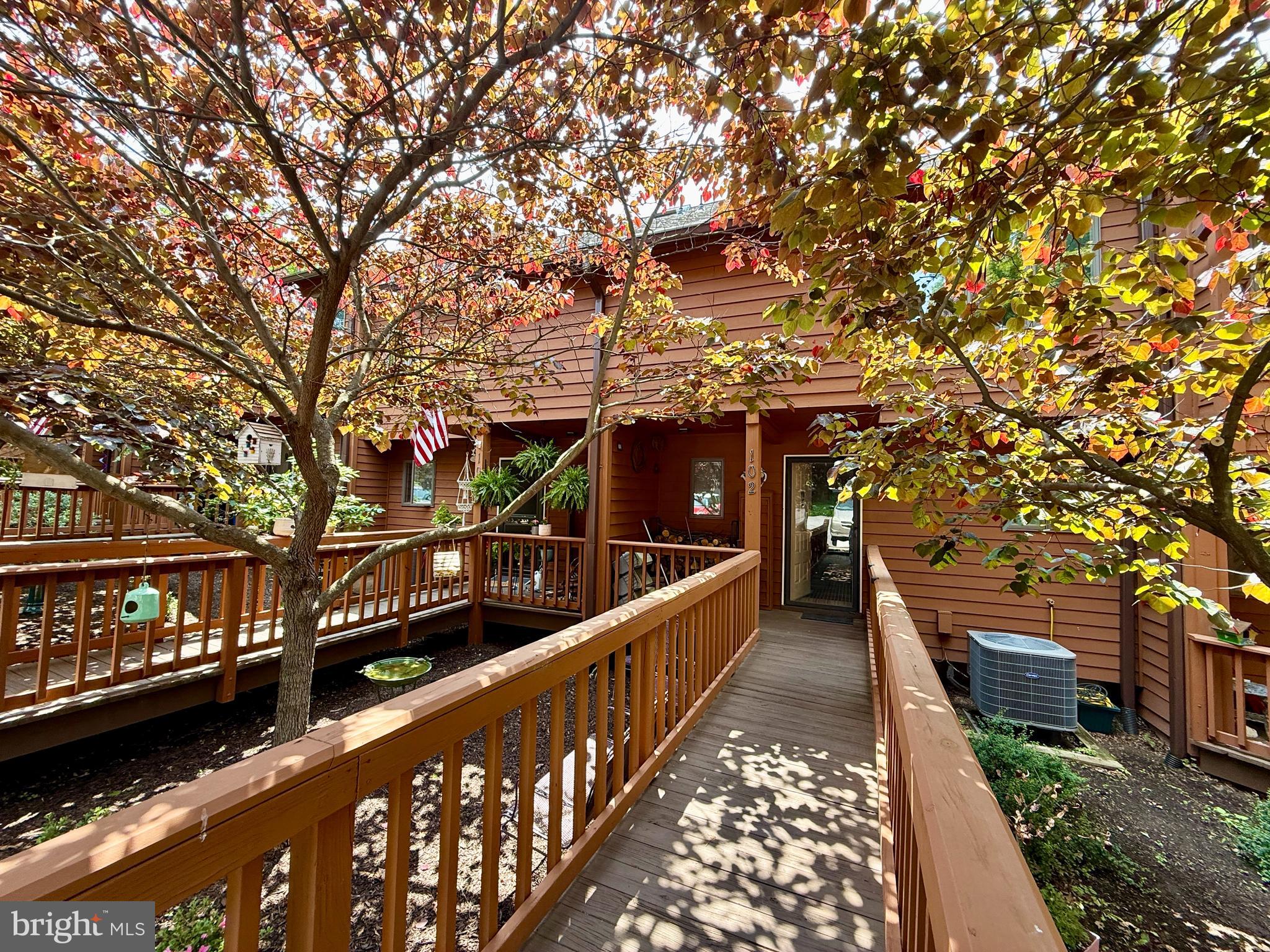 Living in this three level villa is like living in a treehouse. Two bedroom and the possibly of a third on the finished lower level. The main level is the living/dining/kitchen area and includes a cozy wood fireplace. Also a convenient half bath on this level as well. The second level has two bedroom and 2 full bathrooms and includes the laundry area as well. The lower level has a large finished area, another full bath and a private deck. Roof was just replaced in 2024.
If you have always wanted to live in a treehouse don't miss your chance to see this one.