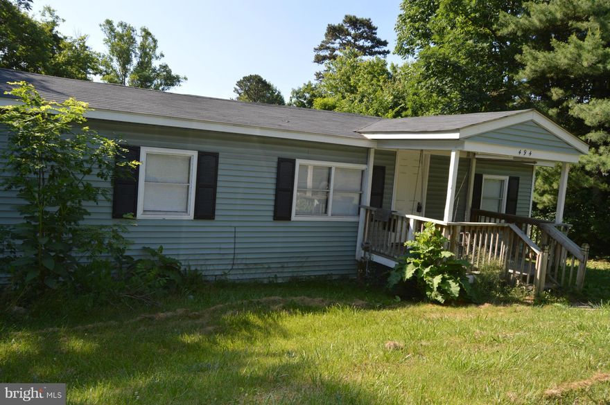 Newly Renovated Home on Spacious Lot* 3 Bedroom 1 Full Bath Home* Eat in Kitchen*Freshly Painted* New Carpet* Large Deck*Shed* Front Porch w/Swing*Lots of Parking*Right off Hard Top, Road to be Paved* Community has fishing/swimming lakes* tot lots*water access*basketball courts*Age is approximately.Finalizing Signatures*