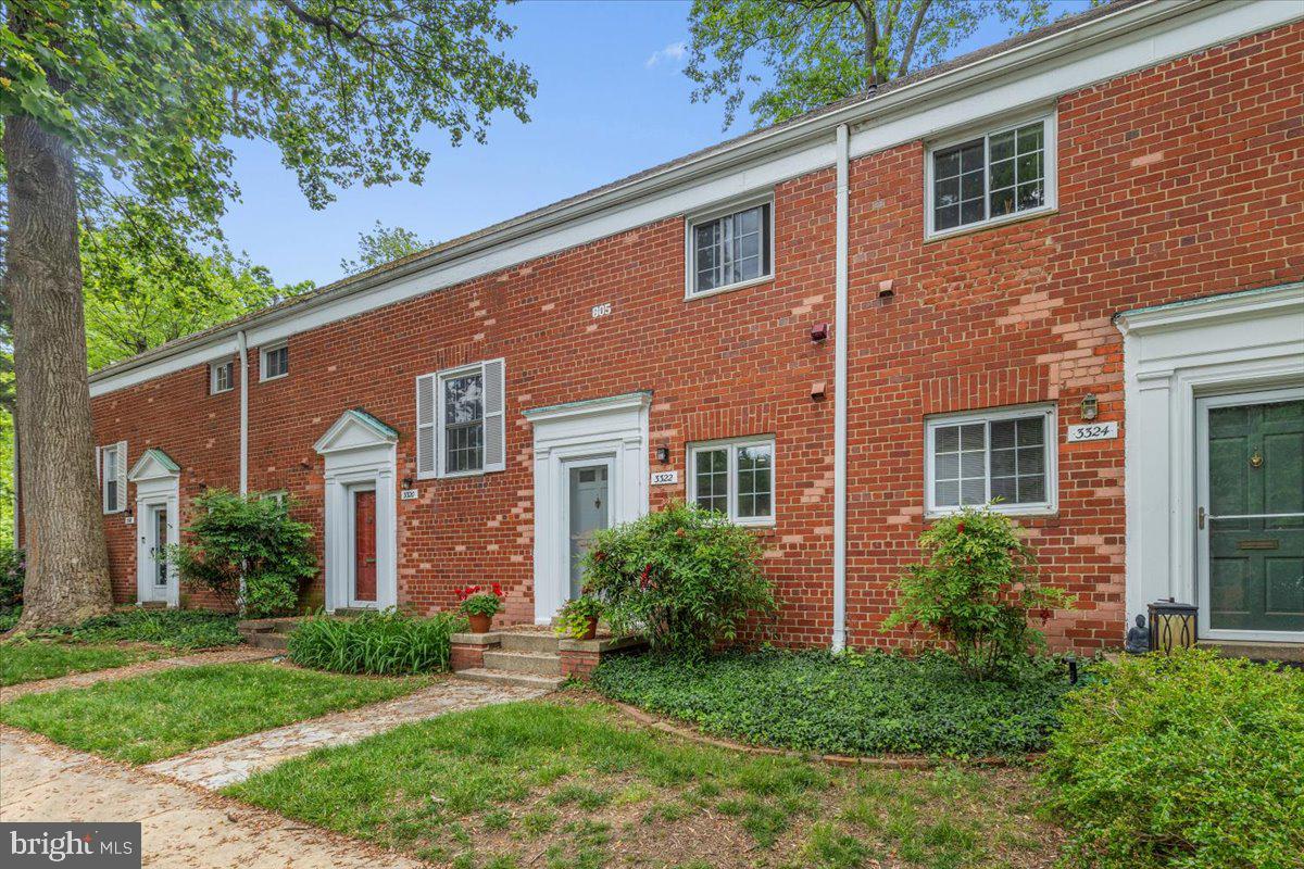Would you love lots of windows and an incredible outdoor space—all in an amazing community in a park-like setting? This open-concept, remodeled home has carefully selected fixtures and lighting, and stainless-steel appliances. Cherry paprika cabinetry and doors throughout create warmth and harmony. The kitchen has an inset range exhaust fan; a large sink; a brand-new counter-depth refrigerator, and new electrical panel. The countertops are an exquisite Brazilian granite. The bath is spacious with a small footprint tub, compact Bosch washer dryer, and contemporary Danze brushed nickel fixtures. French doors open into the bedroom that has a large closet, and remote-controlled ceiling fan. Enjoy the wide, brick patio—perfect for relaxing, gardening, or entertaining! You’ll find beds of gorgeous daylilies and Lily of the Valley, and its own spigot. During the summer, take a dip at the beautiful Coryell Lane pool that’s close by. Association fees cover water, gas, trash, recycling, and snow removal; and amenities galore such as volleyball, tennis and whiffle ball courts, a gym, 3 pools, car wash bays, tot lots and wooded paths. This home has the lowest association fees of all the models and comes with a storage unit. If you like convenience, it has off-street parking at the front door; easy access to the Pentagon, and Washington, DC via car, bus, or bike paths; shopping/dining, and two dog parks nearby for this dog-friendly neighborhood.