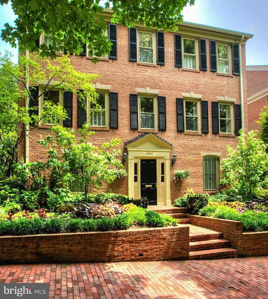 Stunning 4 BR 5.5BA residence in Georgetown's East Village- coveted historic block! Entry Level w/ custom office, bedroom w/ en suite bath, and Family Room. Generous Main Floor includes renovated Kitchen and Dining Room/Living Room leading to patio. Upper Level features stunning Master Suite and 2 BA with baths. Patio and enchanting Garden perfect for elegant entertaining or escape. ONE CAR GARAGE