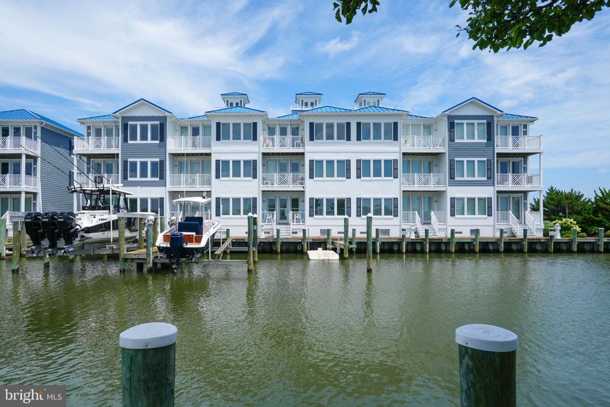 This luxury coastal home in West Ocean City with views of the inlet and marina has just been listed. This is a very unique opportunity to own this 3069 sq. ft townhome, with elevator, in sought after Inlet Isle. This beautiful townhome would make a perfect second home or primary residence. This home has ALL the latest finishes and upgrades. The home is complete with Plantation shutters for all windows. The first level has one of the home's two family rooms which could also be used as a game room, home office or fourth bedroom.   It has a gas fireplace, full bath and custom shower. The first level also has a deck which leads to the pier and boat slip.   The laundry room is also conveniently located on this floor. Take the stairs or the elevator to the second floor, where you will find a luxurious primary bedroom suite overlooking the water with en suite bathroom complete with heated floors, steam shower and soaking tub.  Also, the primary suite offers his and hers walk-in closets. On the second level there's also another bedroom with en suite bath with shower and walk-in closet. Continue by way of the stairs or elevator to the third level, where you will find a spacious family room with gas fireplace, dining area, upgraded kitchen with an abundance of cabinets, granite countertops, stainless steel appliances, a wine refrigerator and breakfast bar.  There is also a wet bar next to the fireplace with built in shelving on the other side. This floor also has another bedroom with full bath with shower and walk-in closet.  Both the second and third floor decks have stunning views of Ocean City.   There is a deck off of this family room that overlooks the marina and has fabulous sunset views. For even more beautiful views take the spiral staircase up to the crow's nest on the rooftop and enjoy the sights of Ocean City.  It is close to the inlet, restaurants, shopping, water sports, the Ocean City beach and boardwalk. It is also in the perfect location to watch the fireworks and the boats in the inlet and marina.  This unit is fully furnished, just bring your bathing suit and your toothbrush.  It is beautifully decorated and furnished.  The oversized boat slip and lift that will accommodate a 38-foot boat with a weight capacity of 25,000lbs.
Listing Office