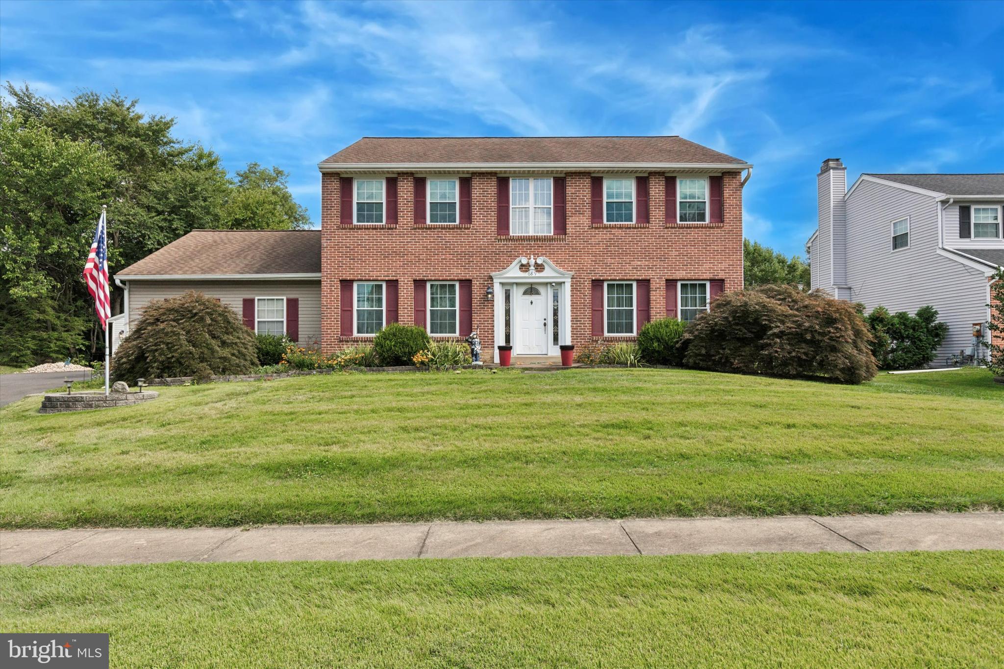 Tucked away in the heart of Southampton, this 4-bedroom, 2.5-bath center hall colonial invites you in with its classic design and thoughtful spaces. Step through the front door into a two-story foyer that sets a warm tone for the rest of the home. On one side, a cozy living room welcomes quiet moments, while the dining room on the other side promises lively meals and special celebrations. The kitchen is the true gathering spot, with granite counters, a center island for casual conversations, a pantry for easy organization, and a bright bay window that fills the breakfast area with natural light. Just beyond, the family room is ready for relaxed evenings by the gas-burning fireplace, with a sliding glass door leading to a composite deck overlooking a fully fenced, level yard—a perfect backdrop for summer barbecues or autumn evenings under the stars. Upstairs, the primary suite is a calming retreat with its own private bath, while three additional bedrooms and a freshly updated hall bath create space for everyone to unwind. Practicality meets convenience with both an attached and a detached 2-car garages, offering plenty of room for cars, hobbies, or extra storage. The property is energy efficient with solar panels. Set just minutes from the PA Turnpike, US Route 1, and I-95, this home makes commuting simple while providing a peaceful retreat at the end of the day. This is a home where memories are waiting to be made. Showings will begin on September 12th.