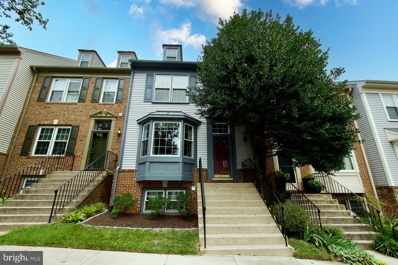 Wonderful 4-level 4 bedroom, 3.5 bathroom townhome with view of common area. New carpet. Windows are about 11 yrs old. Step down living room that is open to the dining room. Huge eat-in kitchen with a center island. Stainless steel appliances. French doors open to deck. Large primary bedroom has a vaulted ceiling, luxury bath with soaking tub, separate shower and double sinks, and a large walk-in closet with a fantastic organizing system. Loft is located in the primary bedroom and has two storage areas. Lower level has a huge 4th bedroom and full bath. Laundry is located under the stairs. Nice size family room with wood burning fireplace and walk up exit to the fenced in back yard. Transferrable SUPER home warranty. Window unit in loft storage area and humidifier convey "as is." Great schools, great neighborhood, great location!! Don't miss seeing this home.