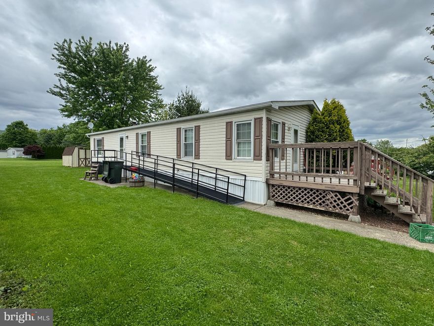 Immediate occupancy available.  Spacious 3 beds/2 full baths 28x60 DBLWDE (1999 Fleetwood) situated in Mimosa mobile home park (over 55 age restricted) with pet friendly rules. $485 mo lot rent. One of the best lots in Mimosa MHP. There is ramp access. Recent improvements include: new roof (2020), new HVAC (2022) , new refrigerator, new washer and dryer. Ready for your cosmetic inspiration (could use new carpet/kitchen flooring, paint, and cabinets painted. Lots of space with a large living room and kitchen with island. see 25+ pics.