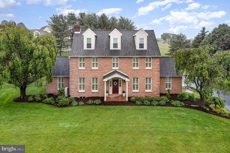 This home is nothing short of a stunner, it has everything you could want and then some.  Walking through the home you will be lured in at every turn and every look.  Walking in from the garage and side door entrance which is what the family has always done, you will enter right into the kitchen and see the expansive combined kitchen and informal dining area.  The white cabinets and beautifully coordinated countertops make the kitchen very light and bright.  There is an island as well as a peninsula with seating for a casual breakfast or lunch.  The kitchen opens up to the attached family room, a versatile space as prior to 2018 it was the formal dining room, but has most recently been used as the "TV Room".  At one end of the kitchen is a formal dining room, but at the other end is a cozy den with a wood-burning fireplace and LOTS of beautiful windows.  If you enter the home through the front door, to your left you will find a beautiful formal living room before you head down the foyer hallway into the rest of the first floor living space.  Heading up the beautiful wooden stairs to the second floor you'll find the primary bedroom with attached full bath, along with two additional bedrooms that are joined by a Jack-and-Jill full bath.  But we aren't finished yet, head up to the third floor where you'll find another open concept bedroom area with an attached full bath, as well as a fifth bedroom!!  Need a space for recreation?  Take a trip to the basement complete with a wet bar, space for exercise equipment, a TV area, additional unfinished storage space AND another complete room that can be used as an additional guest room, home office, flex space.  It's in this additional bedroom space in the basement you will find the FOURTH full bathroom in the house.   Did I mention the back yard yet?  Access the back yard through a beautiful patio door off of the kitchen area or from the side foyer area of the house - and you will walk onto a beautiful fenced in patio and pool area.  For added shade and comfort, open the retractable awning and enjoy to your heart's content.  The home has been loved and lived in with many family memories created and the owners would love for someone else to continue to fill the home with love.