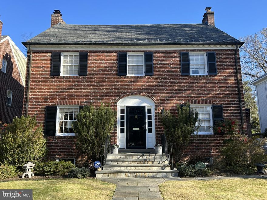 3921 Oliver Street in Chevy Chase Village is a stunning red brick colonial home that welcomes you with a polished black front door on a quiet, tree-lined street that embodies both classic elegance and charm. This home offers traditional brick, a symmetrical facade, and timeless architectural details such as shuttered windows and gracious entryways. Inside, find a spacious, formal living room with a gas fireplace, sitting room with double doors leading to the deck, a dining room, a foyer, and a half bath.  The kitchen features an ample-sized breakfast area, cherry cabinets, access to the deck, a separate side door, granite counters, and stainless-steel appliances.  Gleaming hardwood floors and crown moldings adorn this inviting main level. 

The upper level boasts three bedrooms and two full baths, including a primary bedroom with a ceiling fan and en suite bath. The two additional bedrooms share the full hall bath.

An additional bedroom, full bath, and a large finished storage area complete the top level.

The lower level presents soaring ceilings and recessed lighting and features a charming gas fireplace in the spacious recreation room. A full bath and laundry/mechanical room with convenient access to the backyard complete the lower level's offerings.

The expansive and level backyard features a deck ideal for entertaining! Welcome the new season with beautifully raised wooden garden beds ready for your spring plantings. 

Additionally, the private driveway and one-car garage provide secure, hassle-free parking for daily convenience.

The surrounding neighborhood is coveted for its serene atmosphere, with mature trees, well-manicured lawns, and a strong sense of community, all while being conveniently close to Washington, D.C.’s best amenities.