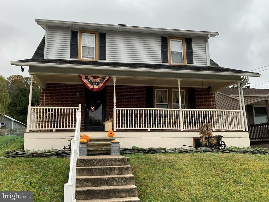 One of a kind 2 story with beautiful details.  Beamed ceiling & wood floors.  Replacement windows throughout.  Primitive kitchen with built-ins.  Must see to appreciate.  Off street parking.