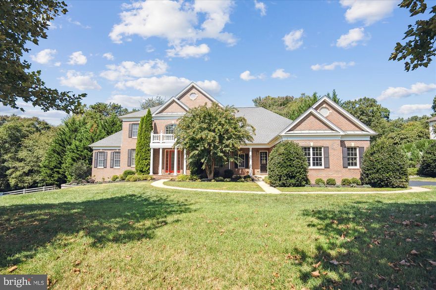 Wow, Grand Toll Brothers Chamberlain Tradition model with hardwood flooring through out and a 29x14 conservatory with cathedral ceiling. All 4 bedrooms upstairs has it's own bathroom. Huge composite deck of kitchen area. Recent stone patio off finished walkout basement. Large sunken family room with stone fireplace.  Two story foyer with semi circular staircase, and rear staircase  for your convenience. Gourmet kitchen with cherry cabinets, stainless steel appliances, granite counters, and breakfast area.