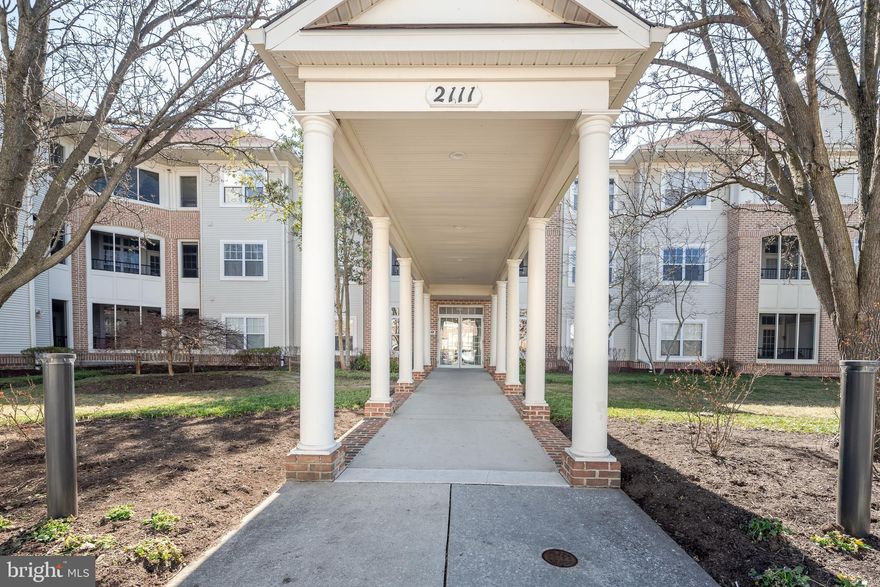 Wonderful and rare opportunity to be in Fairways Courtyards at Waverly Woods! A 1st floor condo with a  balcony overlooking the golf course!
Enter the home and step onto the  Foyer with Hardwood Flooring. Primary Bedroom (En Suite!) is on your right with a large Bathroom and a Walk In Closet -  ALSO overlooking the golf course!
The open floor plan makes entertaining a pleasure! Living Room and Dining Room flow together.  There is a beautiful  Balcony, FOR relaxing, eating, and entertaining . Your Kitchen has plenty of space for a table! The 2nd Bathroom and  Bedroom are adjacent to the large Living Room. Back out of the condo... building is locked and has a beautiful Entryway! There is an assigned parking spot in the Garage so you never have to brave the elements getting into or out of your car. An access Fob is included. There ARE additional parking in front of the building!