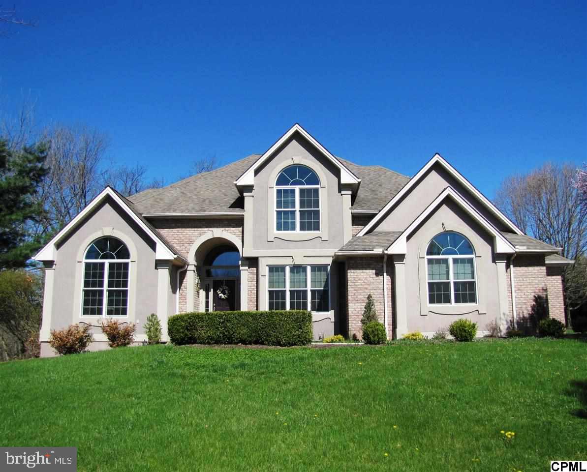 Well-designed & beautifully appointed home on 1.7 acres. Gourmet Kit boasts granite counters, center island & updated appl. Gleaming wood flrs grace formal LR & DR. FR w/FP leads to relaxing deck & screened gazebo w/wooded views. Exquisite MBR w/resort-style bath. Custom tile & glass walk-in shower. MBR Dressing Rm w/custom cabinets. Spacious BRs. Walk-out LL leads to deck w/hot tub. 1st flr Laun, gated Wine Cellar & 3-car gar.