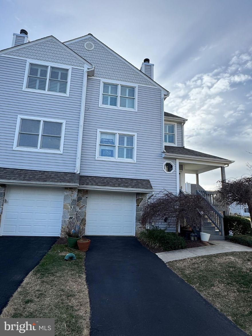 Will be active 01/20. First open house Sat. 01/24 1-3pm.  Professional photos and floorpan forthcoming. End-unit three-level townhome overlooking the pond in Bayside community. Freshly painted, new LVP on lower level. Engineered wood floors on main level. Sliding door overlooking rear deck, sliding door overlooking rear patio on lower level.