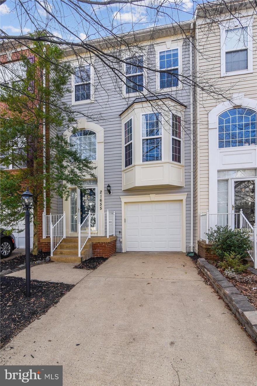 MULTIPLE OFFERS RECEIVED! FABULOUS town home in the BROADLANDS!  Featuring 3 Bedrooms/2 Full Baths/2 Half Baths & 1 Car Garage! This home has been well cared for and Sparkles with Fresh Paint & New Carpet ** Newer roof (2015),  HVAC (2016),  Hot Water Heater (2018) ** Hardwood Foyer with Palladium Window ** Living/Dining room combo ** Spacious Eat-In Kitchen with Newer Appliances * Primary Bedroom with Vaulted Ceiling, Private Bath with Dual Sinks, Soaking Tub and Separate Shower ** Large lower level Recreation Room with Walk-Out to Wooded area ** GREAT Location- easy access to Dulles Greenway & Rt. 28!