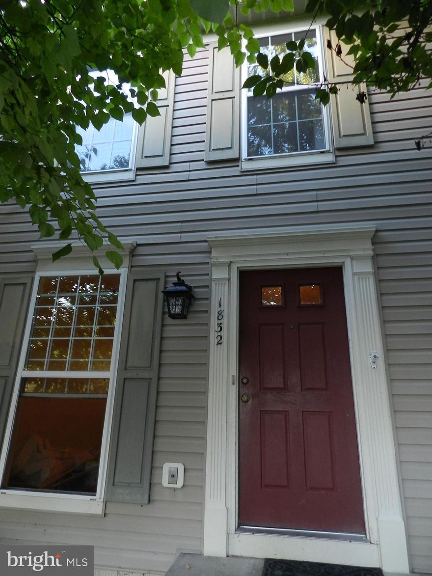 SUPER AFFORDABLE THREE LEVEL CONDO TOWN HOME, ONE STOP LIGHT AWAY FROM I95! BRAND NEW LAMINATE PLANK FLOORING JUST INSTALLED ON ALL 3 LEVELS>FRESHLY PAINTED AND KITCHEN GIVEN A FACE LIFT>HOME BACKS TO THICK WOODS AND HAS A LARGE DECK, VERY PEACEFUL AND SCENIC>LARGE WALK OUT REC ROOM>TWO PARKING SPACES>KITCHEN HAS STAINLESS STEEL APPLIANCES, A WINDOW AND PANTRY>GREAT STARTER HOME>WOODBRIDGE HIGH