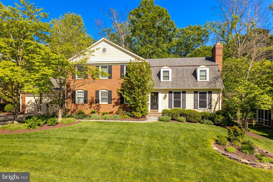 Welcome to 7401 River Falls Drive, a stunning colonial home located in the heart of the River Falls neighborhood! This generously sized home offers six bedrooms and four and a half bathrooms on three fully finished floors. This open floor plan is an ideal layout for both family living and entertaining!  The main level features beautifully maintained hardwood floors and an abundance of natural light. The living room includes a wood-burning fireplace and perfectly captures the picturesque sunset views with the western exposure. Enjoy entertaining with the built-in sound system and a dining room open to the kitchen and living room. The modern kitchen highlights custom tile backsplash, granite countertops and modern appliances including the wifi-enabled smart  refrigerator. The kitchen offers a gracious amount of cabinet space, providing plenty of room for storage. In the early morning hours, you can take in the sunrise as it beams through the bay windows. The open family room is the perfect living space with built-in shelves, an exposed brick wood-burning fireplace and deck access.  The hardwood floors continue to the upper level where five bedrooms and three full bathrooms can be found. The spacious primary suite is adjacent to the beautifully designed primary bathroom complete with marble flooring and countertop, as well as a porcelain tile walk-in shower. Four additional spacious bedrooms occupy the upper level that include comfortable closet space in each room.  The luxury continues to the lower level which is over 1,700 square feet of finished space! The living area features a stone wood-burning fireplace with an unheard amount of natural lighting for a lower level.  The additional room features two built-in desks and cabinet space making this the ideal setup for working-from-home or virtual learning. This level has a walkout to the backyard and also includes a bedroom and full bathroom.  The beautifully landscaped backyard is perfect for family living. Enjoy the benefits of having both a two-tiered deck and a fenced yard. The attached two-car garage is not to be missed, as well as the extended driveway for additional parking. The front yard is perfectly highlighted by the natural flower beds and Cherry Blossom trees. Overlooking Rock Run Creek, take in the wooded views and harmonic sounds the natural setting has to offer.  River Falls is an incredibly special community featuring a neighborhood clubhouse, swimming pool, tennis courts, playgrounds and fields, making it an extremely sought-after place to live! Enjoy everything this community has to offer, while also being in close proximity to Clara  Barton Parkway and I-495, making commuting very convenient. The endless trails and  parkland surrounding this neighborhood can be enjoyed all year round. With so much to offer, do not miss the opportunity to make this your home!