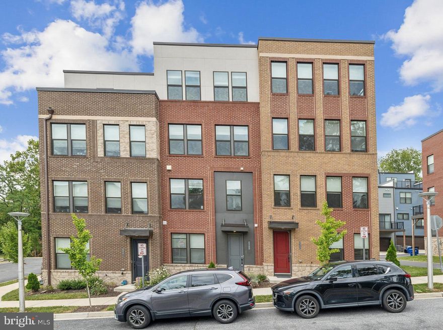 PRICE REDUCED and Up to $30,000 in incentives towards CLOSING COSTS and/or RATE BUYDOWN with the use of seller-preferred lender. Stunning 4-Level Townhome with a Rooftop Terrace in Newer Community! This modern 3-bedroom, 3-full-bath, 2-half-bath townhome offers spacious living across four thoughtfully designed levels, perfect for families or anyone seeking ample space and flexibility.  Step inside to a versatile den, ideal for a home office or cozy retreat. Enjoy the convenience of a half bath and a spacious 2-car garage. You will enjoy cooking in this beautifully designed kitchen with granite countertops and an inviting island, perfect for casual dining and entertaining. The open-concept living room leads to a lovely balcony, ideal for morning coffee or evening relaxation. Elevate your lifestyle with a private bedroom and full bath on the top floor, accompanied by a spacious living room and a stunning terrace—perfect for alfresco dining or soaking in the sunset. Walkable neighborhood.  Close to Union Craft Brewing and the Union Collective, Johns Hopkins University, the Rotunda, fine dining on the Avenue, and all the attractions of Hampden Commuter-friendly to JHU, I-83, I-695, and more