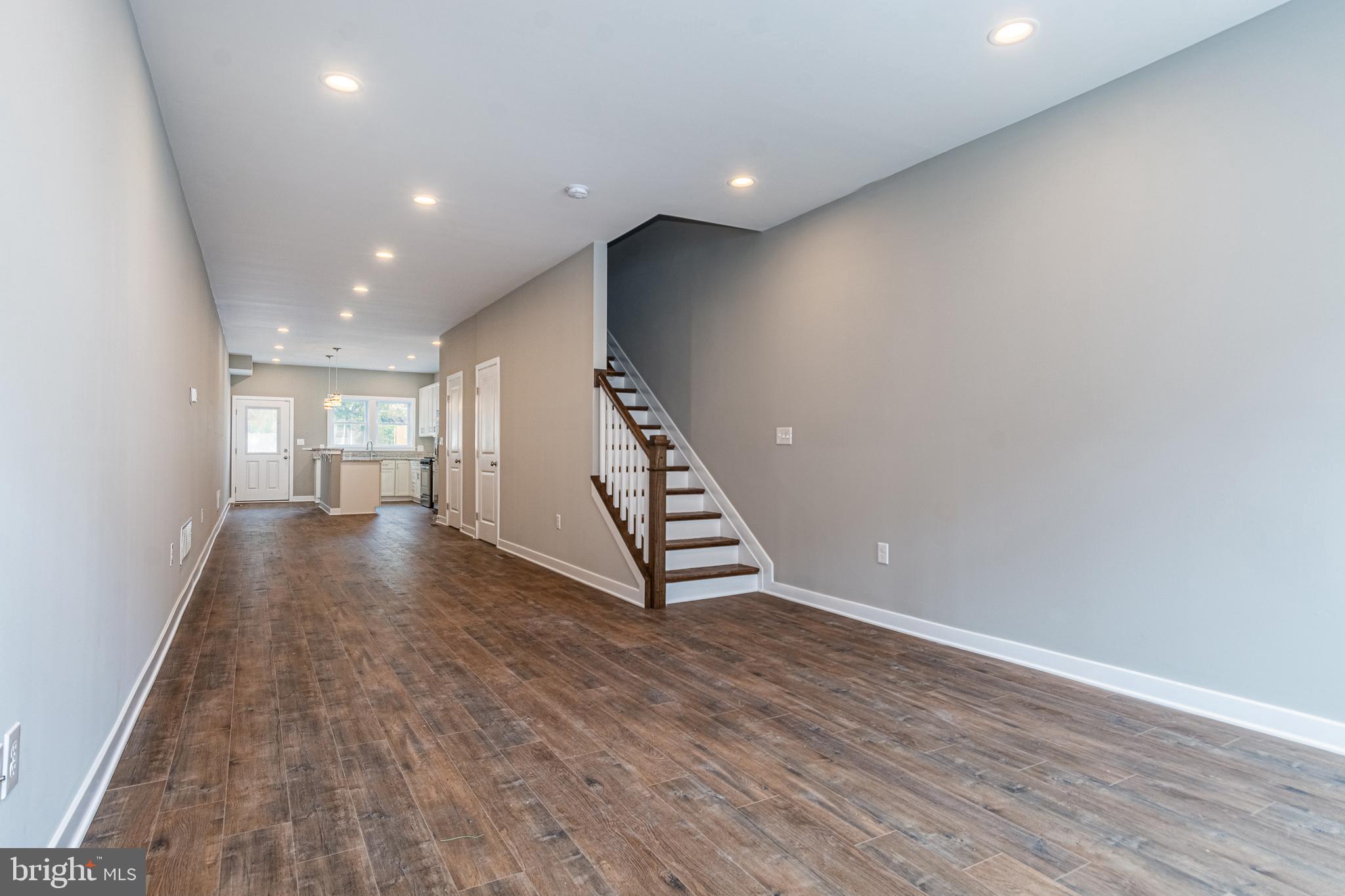 INTRODUCING UPTON GATEWAY - MAKE HOME OWNERSHIP A REALITY! 38 LUXURY RENOVATIONS WITH TONS OF BUYING INCENTIVES THAT MAKE OWNING A HOME MORE AFFORDABLE THAN RENTING! Standard features include 3 finished levels, wood floors throughout the main level and hallways, carpet in bedrooms, kitchens with 42" cabinets, Frigidaire ss appliance package, and granite counters. Main level with an open floor plan featuring a spacious living room, separate dining area, and kitchen, upper level Primary bedroom suite with full bath and walk-in closet and a 2nd bedroom with a hall bath and bedroom level laundry, 3rd level with 3rd bedroom and a family room, and 2 car off street parking! Tons of buying incentives including 10K Vacants to Values grant, 25K Live Near You Worship Grant, and a $2,500 lender credit when you use the preferred lender! Pictures are of a finished home in Upton Gateway