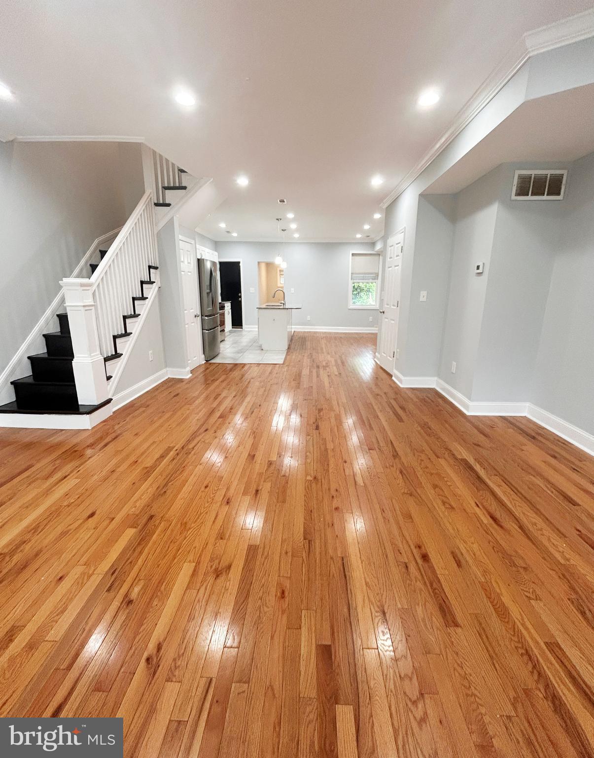 Welcome to this stunning, fully renovated 4 bedroom, 2.5 bathroom home that combines modern style with timeless comfort. The home features recessed lighting, baseboard and crown molding, and solid hardwood floors throughout. The spacious kitchen boasts sleek granite countertops, ample cabinet space, and stainless steel appliances including gas stove, dishwasher and built-in microwave, perfect for any home chef. The generous living areas offer plenty of space to relax or entertain, while the finished basement provides endless possibilities—whether it’s a home theater, office, or playroom. Retreat to the beautifully updated bedrooms on the second floor, including a primary suite with a luxurious en-suite bathroom for ultimate privacy and relaxation. With a powder room on the first floor, a large backyard, newer HVAC system, and a full finished basement with washer and dryer, this home is perfect for both family living and entertaining. Conveniently located near major roadways and local universities, this home provides an easy commute to all areas of the city and suburbs.