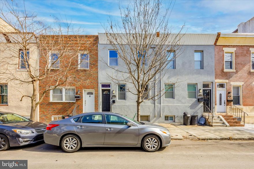 Welcome to 1633 S 21st Street! This stunning 3 bedrooms, 2.5 bathroom gem boasts a generous 1400+ square feet of meticulously designed living space and is conveniently located in Point Breeze . As you step inside into the open concept layout, you’ll be greeted by hardwood floors throughout the home, and the abundance of natural light that floods through the windows. The kitchen features rich wooden cabinetry, stainless steel appliances, white subway tile backsplash, and a L-shaped breakfast bar with granite countertops. Then make your way to the back patio, perfect for outdoor enjoyment and hosting summer barbecues. Upstairs, you’ll find 3 spacious bedrooms with ceiling fans and ample closet space. The hallway bathroom features dual vanity and a tile-surround tub. The master bedroom features a large closet space and an ensuite bathroom with beautiful tile surround. The finished basement has a dedicated laundry area and adds versatility to the property, providing additional space for recreation, gym, or a home office. The home has central A/C to keep you comfortable in the summer. Your new home is in close proximity to all of the restaurants, bars, grocery stores, parks, and coffee shops that Point Breeze has to offer. Schedule your showing today!