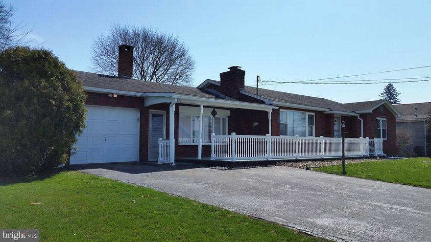 Nice brick ranch with a full basement  in McAlisterville! New Kitchen with dining area, large family room with a fireplace, nice living room with a fireplace, 2 bedrooms, 1 bath and a 1 car garage/workshop. Enclosed back porch with an additional roofed open porch. Hardwood floor in living room and bedrooms. Full basement. Call today!