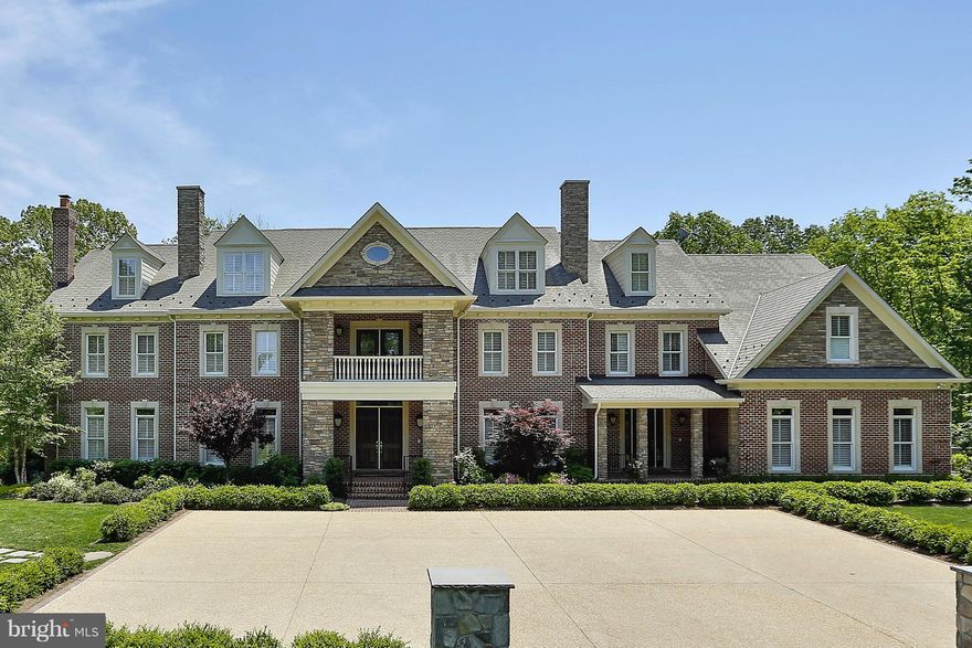 Serene setting on 7.5 manicured acres backing to 5000 acres of parkland.  All brick construction, stunning interior, elevator, walkout lower level, separate detached entertainment pavilion, generator, 2 wells (one just for irrigation), professionally landscaped, courtyard parking, 4-car garage, and so much more!