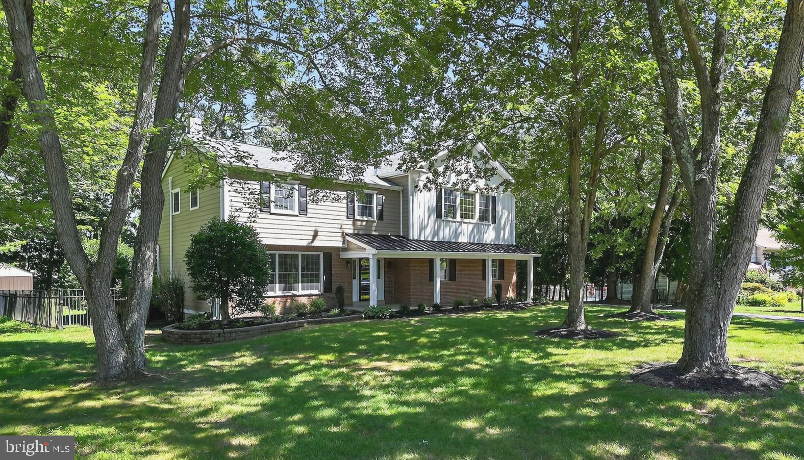 Completely renovated and move-in ready, this stunning 4-bedroom, 3.5-bath colonial residence perfectly blends timeless craftsmanship with modern luxury. Situated on a private lot in the coveted Tower Hill Woods community within the Central Bucks School District, this home offers elegant living space. The main level welcomes you with new, beautiful hardwood floors, a spacious living room, and an open dining area featuring sliding glass doors leading to a large back deck, perfect for alfresco dining and entertaining. The chef’s kitchen dazzles with a deep farmhouse sink, designer tile backsplash, stainless steel appliances, and a breakfast bar, seamlessly flowing into an expansive family room complete with a striking brick fireplace, large windows, powder room, and triple sliders to the deck—ideal for effortless indoor-outdoor living. Upstairs, the luxurious primary suite impresses with a tray ceiling, oversized windows, a generous 12x6 walk-in closet, and a spa-inspired ensuite bath featuring a frameless glass rain shower. A second bedroom also includes a private ensuite and walk-in closet, complemented by two additional bedrooms and a third full bathroom with a tub. The finished lower level provides versatile bonus space for a gym, media room, or play area. Enjoy the fully fenced, level backyard backing to a mature tree line for added privacy. Additional highlights include ample parking with four open spaces, energy-efficient windows, recessed lighting, central air, and a new dual-zone HVAC system (2022) level backyard is fully fenced in. Perfectly located for convenient access to major highways, transportation, shopping, and dining, this exceptional home offers an unparalleled lifestyle opportunity.
