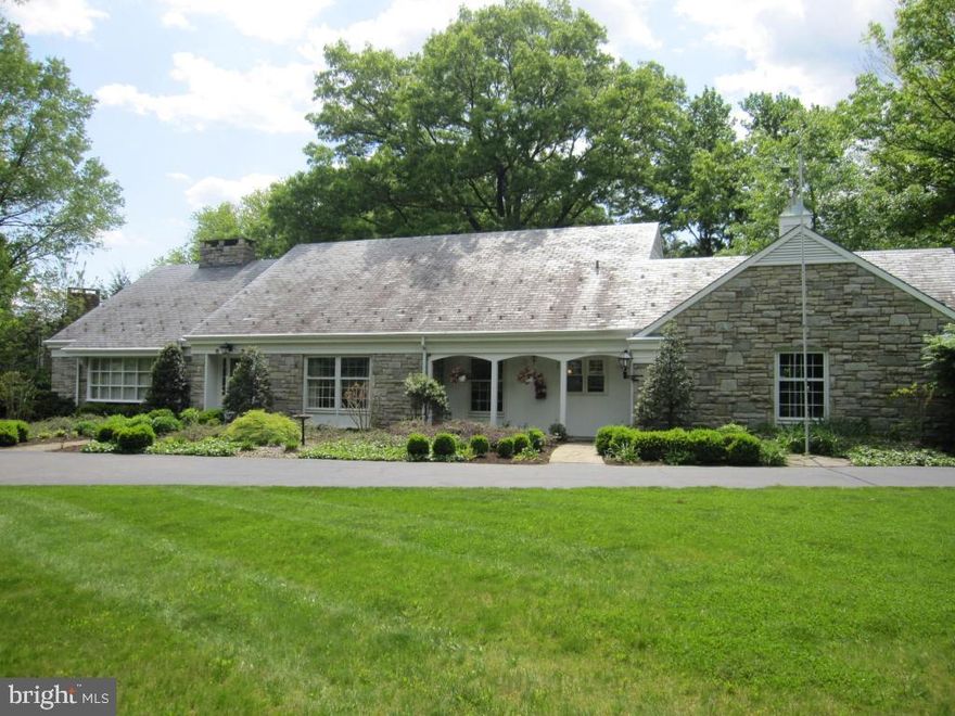 Classic stone home nestled on a park-like setting. Many high-end upgrades include, granite breakfast bar & countertops, cherry cabinetry, Fisher&Paykel dishwasher, gleaming hardwood floors, grand-sized formal Dining Room with 2 corner cupboards and gorgeous finishes. The master suite has 2 closets and a private bath plus a second bedroom, used as an office, and a full bath. The third bedroom, extra -large, on the second floor, has a private,