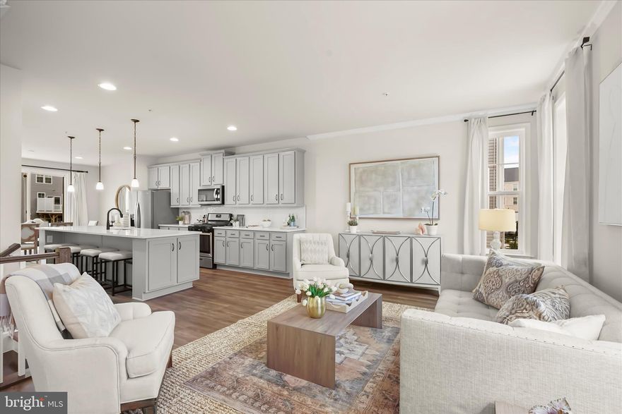 New Listing! Best of the bunch -- picture perfect 3BR/2.5BA end-unit Townhouse with all the bells and whistles. MAIN LEVEL highlights include: spacious LIVING ROOM   /   gourmet KITCHEN with expansive kitchen island with plentiful seating, s/s appliances, pretty backsplash, sleek counters, and abundant cabinet storage   /   formal DINING ROOM idyllic for festive gatherings with access to large BALCONY   /   nicely appointed POWDER ROOM discreetly tucked away.  UPPER LEVEL features are: Luxurious PRIMARY SUITE with enviable walk-in closet and ensuite BATHROOM with dual sink vanity and glass-enclosed shower   /   SECOND BEDROOM with large closet   /    THIRD BEDROOM  with large closet   /    SECOND BATHROOM off hallway with large vanity storage and bathtub   /   LAUNDRY ROOM with full-size, clothes washer/dryer.   Versatile ENTRY LEVEL with wonderful space for playroom/office/gym. access to two-car GARAGE, MUDROOM nook with built-in storage, and sliders to GREENSPACE. Convenient locale in idyllic setting Laurel Overlook is conveniently located between Washington, DC and Baltimore and offers something for everyone.  Shops and restaurants can be enjoyed at the nearby Laurel Towne Centre and charm is in abundance on Laurel Main Street.  There are ample parks in the area are ideal for outings, hiking and picnics, and the easy access to I-95, MD Route 200 (ICC) and the MARC train makes it possible to enjoy so much more.   This one, undeniably, has it ALL!