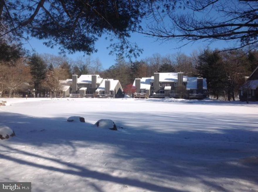 Skiers get  Ready!  Winter is approaching and the seller is offering this move in ready home on Mill Pond in Snow Ridge Village.  Pathway to the slopes.  1 Bedroom on lower level with full Bath and Upper bedroom loft with 1/2 bath and kids getaway. Cedar Shake Roof/Remote skylight 2016, flooring, high hats,& light fixtures. Wifi controlled Thermostats, newer windows & patio door, granite kitchen counter tops, pellet stove, oil fired electric baseboard.. Solid interior doors. Fully Furnished with 3 TV's.  Short Term Rentals permitted. Community water and sewer.