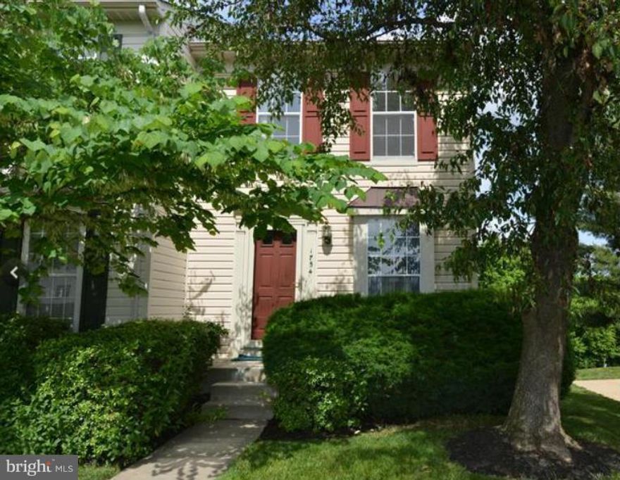 2 br, 2 1/2 bath end unit townhome backs to woods. Finished lower level with recreation room (can be used as 3rd bedroom), full updated bath & gas fireplace that walks out to flat & wooded back yard. Conveniently located close to 95, Rt 123, Fort Belvoir, Quantico & shopping. Tot lot and plenty of visitors parking spaces available.