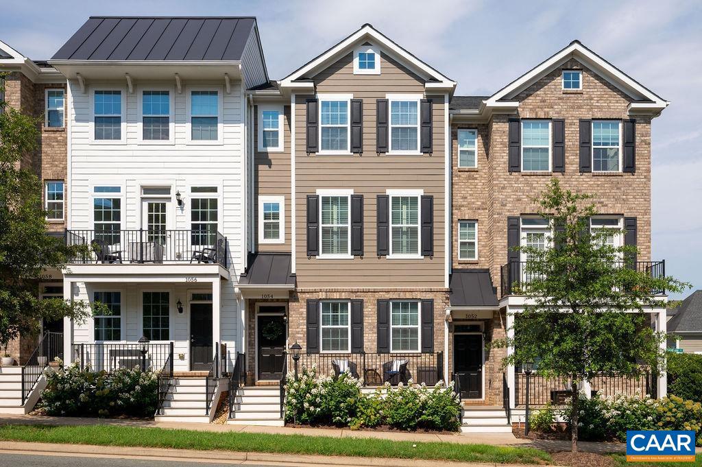 Live where you play in this stylish, low-maintenance townhome in the vibrant heart of Old Trail! Perfect for people on the go, this home offers the ultimate in convenience & community - all with stunning mountain views as your daily backdrop. Walk to your favorite coffee shop or restaurant, grab a smoothie after your morning workout at ACAC Fitness or Club Pilates, & end the day with an evening walk on the many trails or a round of golf at Old Trail Golf Course. Whether you work from home or twenty minutes away in Charlottesville, you'll love the ease of access & the walkable lifestyle this area offers. Inside, enjoy a bright, open floor plan with energy efficient EcoSmart construction & modern finishes, a spacious kitchen with granite counters for entertaining, and plenty of natural light throughout. Everything you need is right outside your door - and when you want to unwind at home, your back deck is the perfect spot for grilling and chilling.,Granite Counter,Maple Cabinets,Painted Cabinets