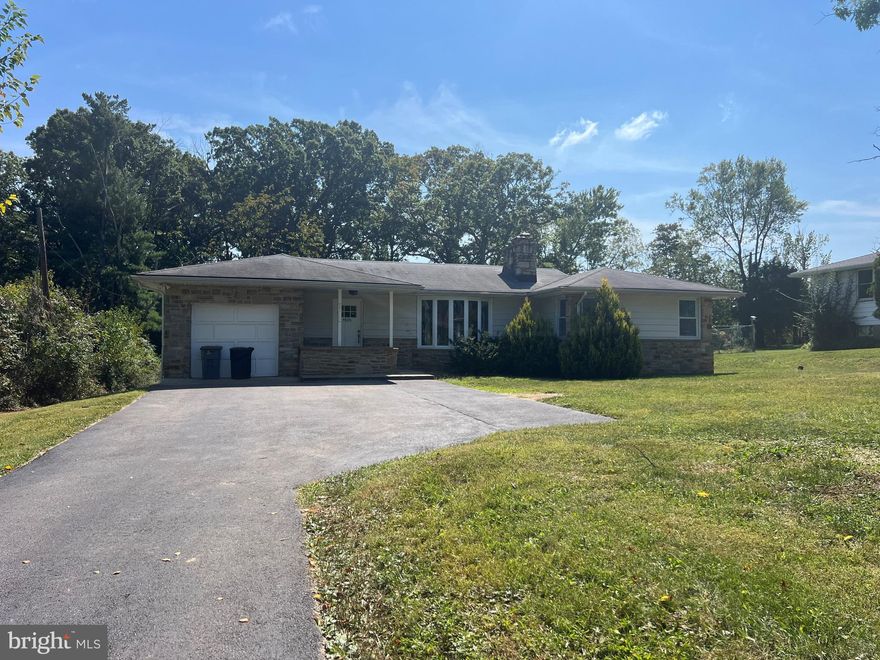 3 Bed and 2 Bath single family home sitting on half acre land in the heart of well desired Woodbridge Valley of Catonsville.  All three bedrooms have fans.  Open lay out, hardwood floors, stainless steel appliances, granite counter give a feel of new home in an old spacious house.  Large backyard with a deck provides privacy for family time in evening.  Finished basement with hard wood floorsLong drive way provides ample parking for many cars.  Close to Fwy 695, Hwy 70, and Baltimore National Pike.