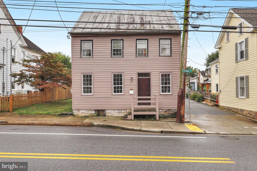 Coming Soon! Historic charm meets modern comfort in this beautifully maintained home featuring central AC and heat—rare for a property of this era. Inside, you’ll find wood floors, exposed brick walls, and thoughtfully updated spaces that balance character with convenience. The kitchen boasts stainless steel appliances, custom cabinetry, while the upgraded baths are finished with stylish tile work. Three spacious bedrooms and 1.5 updated baths provide comfortable living, complemented by a main-level upgraded laundry for ease. Outside, a deep lot with a pergola and patio offers the perfect setting for gatherings, while an outside entrance leads to a hand-dug cellar full of historic appeal. Located near downtown shops, dining, the renowned Inn Boonsboro, and Shafer Park, this home blends lifestyle and location seamlessly. Situated within top-rated schools, it offers both value and charm in one inviting package.