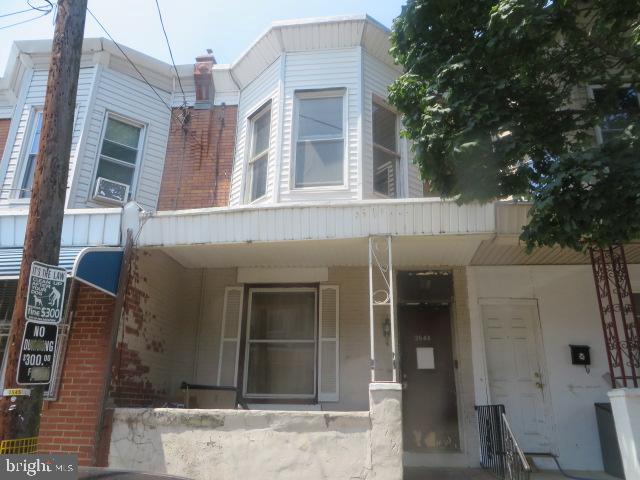 Two story, 3 bedroom, porch front row located just off of A and Tioga Street. Living room, dining room, kitchen on the 1st floor. Three bedrooms plus full bath on the 2nd floor. Large basement and nice sized rear yard. Excellent and affordable opportunity for all buyers. Owner financing available for purchase and/or purchase and rehab! Contact listing agent or see attached document for further details.