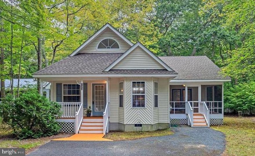 Welcome to this furnished "turn-key" four-bedroom, two-bath home nestled on a desirable park lot in amenity-rich Ocean Pines. Designed for both comfort and functionality, the home features vaulted ceilings that enhance the open feel of the living spaces, complemented by beautiful hardwood and ceramic tile flooring throughout. The spacious living room is highlighted by a cozy gas fireplace, while French doors invite natural light and provide easy flow to the outdoor living areas. The kitchen is well-appointed with Kenmore appliances and offers plenty of space for everyday living and entertaining.
The thoughtful floor plan separates the sleeping areas from the main living spaces, creating privacy and a quiet retreat. The primary bedroom boasts direct access to the screened porch, perfect for enjoying peaceful mornings or relaxing evenings. Upstairs, you’ll find the 4th bedroom with park views and a large workshop area, ideal for hobbies, projects, or extra storage. Both the Roof and the Gas Heat have been replaced in the past 3 years.
With its prime location, sought-after amenities, and unique features, this home offers an exceptional opportunity to experience the best of Ocean Pines living.