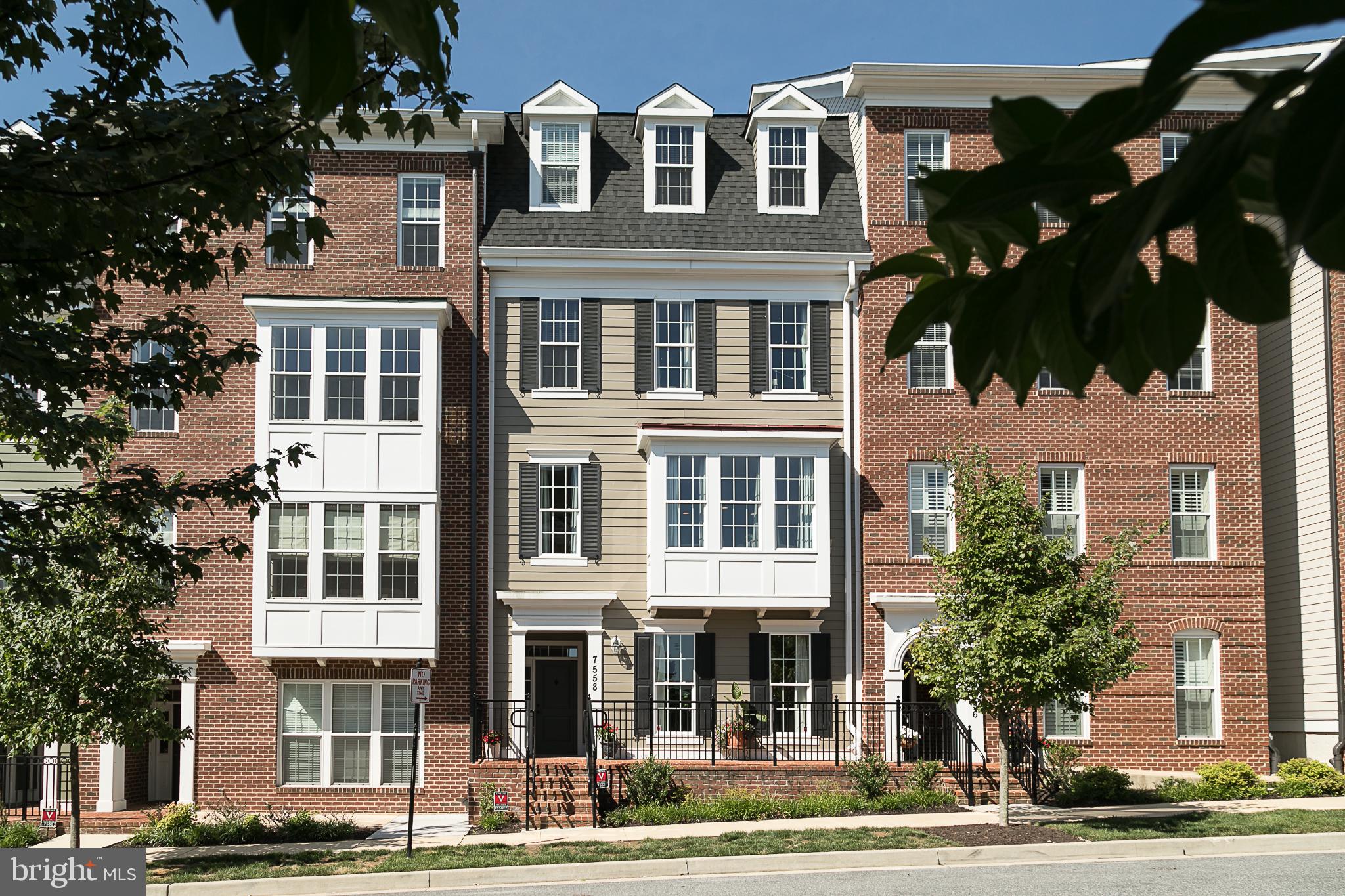 Welcome home! This beautiful, spacious, 2-story town home in the sought-after Maple Lawn neighborhood is updated with custom features, extra roomy, and absolutely gorgeous. The charming front entryway opens into the large, warm living room with huge, bright windows. Follow the hardwood floors past the adjacent half bath. Then it's up the stairs to the large, open concept main floor. The custom designer kitchen has plenty of cupboard space and yet it's filled with cheery sunlight. Enjoy the large quartz counters and stainless-steel gas appliances, custom lighting, breakfast bar with seating. The cozy, inviting family room has plenty of space for seating and family fun thanks to the custom build-out of the bay window! The adjoining dining room is big enough for a large table and chairs. Don't miss the new, sizable pantry! Follow the wood floors and high ceilings past the convenient laundry room to the master bedroom with lots of closet space and gorgeous views. The private master bath has a frameless shower, quartz counters, dual vanities. The spacious 2nd bedroom has ample closet space and its own updated, full bath. Wait! Don't forget the large 1-car garage with flooring, shelving, and newly-created, extra storage space conveniently up above your head! In fabulous Maple Lawn this is one you can't afford to miss!