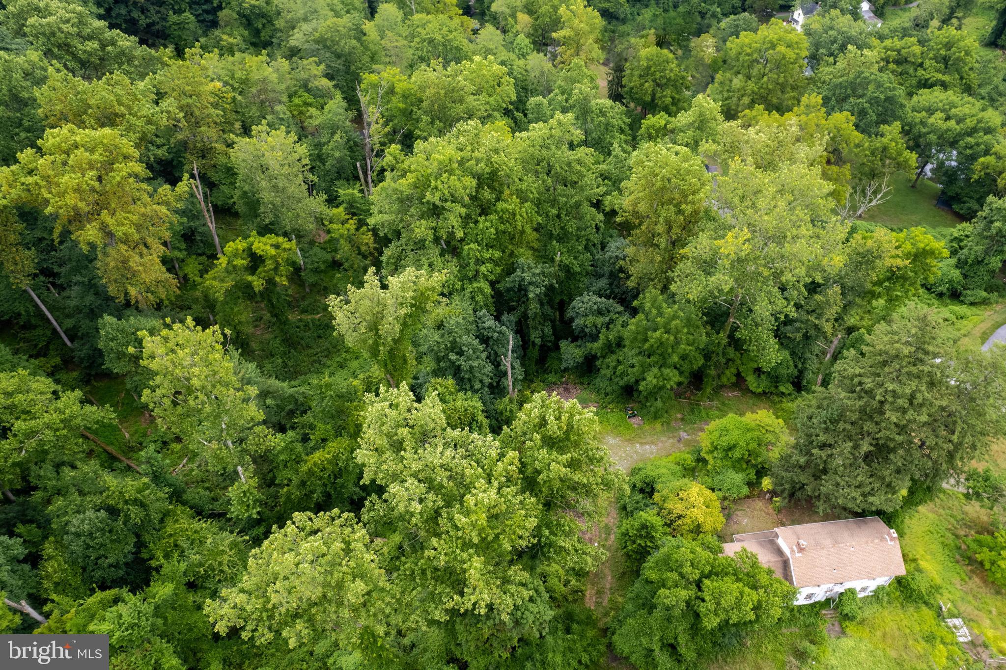 Live authentically. A rare offering in the county. Two building sites with incredible access to everywhere you want to be...A short walk to the trails that surround glorious Lake Roland...Just moments to Whole Foods, The Corner Pantry and the 83. A blank canvas from which to create your sanctuary. Woodlands teeming with life in your backyard. Unleash your vision here. No builder tie-in. Purchase property as a package or individually. A plethora of possibilities awaits your creativity. Please see Hollins Woods Minor Subdivision Plat online. BGE, water and sewer line have been brought to the property boundary. Seller will deliver property at record plat. The property is located within the Ruxton-Riderwood-Lake Riderwood community plan area. All plans must be reviewed by the designer review panel prior to the issuance of building permits. Please see attached bonds. Buyer to install road. The properties exist within the Bare Hills Historic District. Please see attached historic status comments. The house may be removed per the attached letter. ••DO NOT ENTER THE HOUSE•• Lot 1 - .721 acres, Lot 2 - .768 acres. Cultivate your existence. The art of uniting human and home.