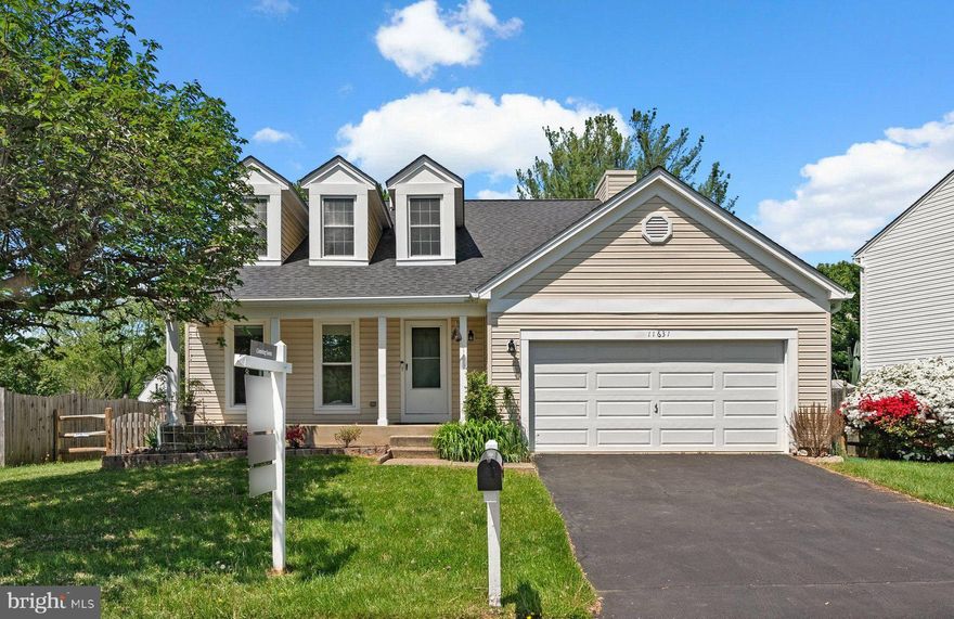 Sensational renovated customized home features a dramatic living room w/ soaring ceiling, an adjoining cozy dining room opens to a reimagined kitchen with custom cabinetry, stainless appliance & quartz countertops. This 3-bedroom,3.5-bath home offers the perfect blend of comfort, style, and convenience.
Enjoy the outdoors on the charming front porch or relax in the nicely landscaped backyard. Additional highlights include a brand new roof, a two-car garage, replacement windows, two wood burning fireplaces, and a full basement with a full bath and a versatile den/office—perfect for remote work, guests, or a home gym. The PERFECT alternative to a townhome! An incredible value!

Located just minutes from popular shopping centers, local restaurants, and everyday conveniences.