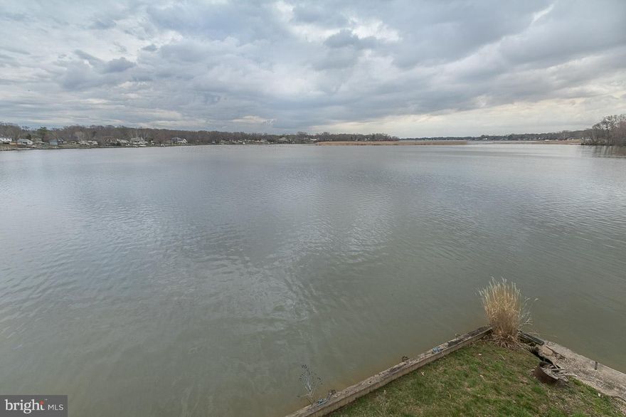 Adorable well maintained affordable waterfront home with water views from kitchen, master and second bedroom and living room.      Deck off living room leading down to yard. Eat In Kitchen, one level living at its finest! Baltimore County has approved dredging funding of a phased 3 year project to dredge waterways.  Flood Insurance Required