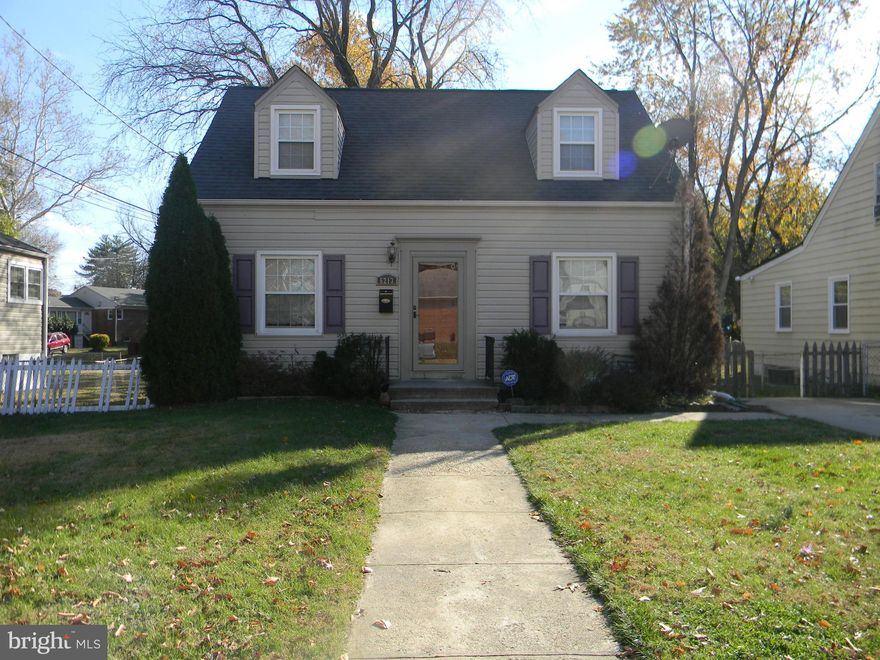 Lovely Single Family, 3 bedrooms, with updated 1 1/2  bath, on quiet street:; updated  kitchen with granite counter tops with dark stain cabinets;  Hardwood flooring in LR, DR, and kitchen; large fenced yard with concrete patio (excellent for grilling);