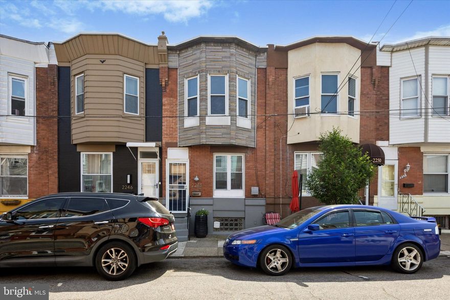 Beautifully Updated Townhome in West Passyunk – Don’t Miss Out! This fresh, newly renovated 2-bedroom, 1.5-bath townhome in the heart of West Passyunk won’t stay on the market for long. Featuring a contemporary design and top-to-bottom upgrades, this home is truly move-in ready. Enjoy an open-concept first floor with solid oak hardwood flooring and high-hat lighting that continues through the upstairs hallway and bedrooms. The kitchen, bathrooms, and fully finished basement feature stylish wood-look ceramic tile for a clean, modern touch. The kitchen features modern wood cabinetry, high-end stainless-steel appliances, granite countertops, and a large breakfast bar perfect for casual dining or entertaining. Additional highlights include updated doors and windows; Contemporary hardware and fixtures; High-efficiency HVAC system with central A/C; Newer Washer and Dryer; Plenty of Storage. Finishes are designed for both functionality and style. No car; No problem — This home is within walking distance to the flourishing West Passyunk Corridor, Public Transportation, and several Shopping centers with everything you need, including Shoprite, Home Depot, Spouts, PetSmart, Planet Fitness, Fusion Gym and much more. Perfect for first-time buyers or buyers on a budget, this is a must-see home in a desirable neighborhood!