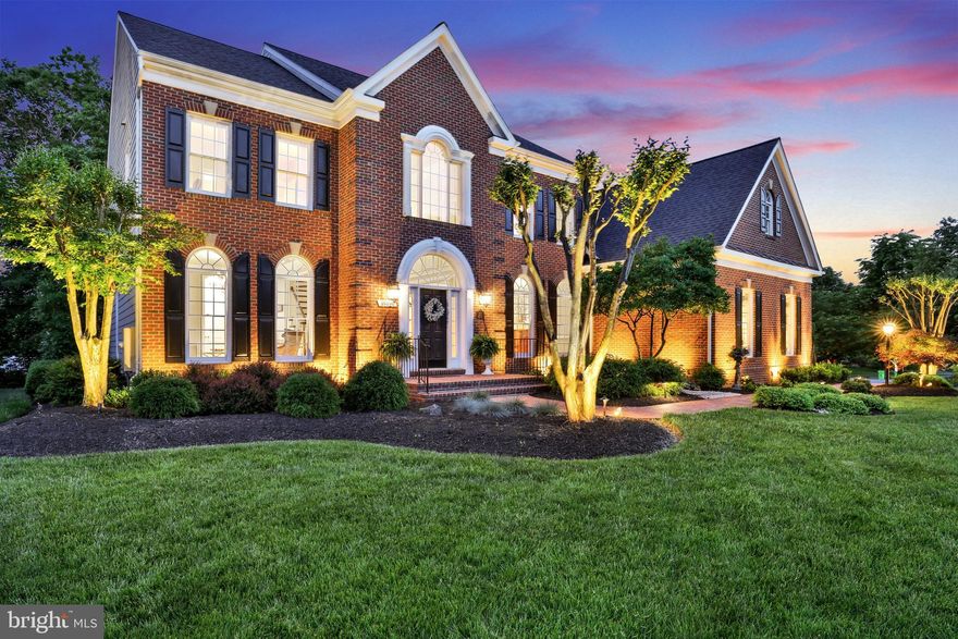 OPEN HOUSE 5/18 IS CANCELLED. Please contact listing agent for a private showing.  This is the one you've been waiting for.  So many updates throughout:  all bathrooms have been updated, new roof (2019), two new HVAC systems (2018-19), incredible decorative touches including illuminated glass shelving in the family room, remodeled mudroom/dropzone, updated upper level laundry room, updated kitchen pantry, primary bedroom closet organizers, basement buffet with undermount lighting, and so much more.   This home in the West Goose Creek section of Lansdowne is more than you expect and more than you've seen; it will surprise you from the time you enter.  The expansive two-story foyer sets the stage for all this home offers, with elegant trim spanning floor-to-ceiling, updated lighting & warm hardwood flooring that runs through the main level.    The formal dining room seats a table large enough to seat extended family and friends, while the formal sitting room offers a quiet retreat.  The gourmet kitchen offers granite counters, a large island with vegetable sink, tile backsplash, updated pendant light fixture, double wall oven, gas cooktop & recessed lighting, and is open to the morning sunroom surrounded by a wall of windows to allow natural light to pour in.  Custom-built cabinetry in the pantry, remodeled mudroom entrance with underlit seating bench.  The three-car garage is a car-lovers dream with new epoxy-finished floor, recessed lighting and workbench.   The family room offers a wall of windows spanning nearly 8' in height, a coffered ceiling, and is warmed by a gas fireplace flanked by custom-built glass shelving with illumination to highlight your favorite pieces.   A main-level office with custom accent trim wall, plantation shutters and updated lighting.   

The upper level offers a spacious primary bedroom that is both elegant and modern in design, with it's wall and ceiling trim, tray ceiling, gas fireplace, updated lighting and separate walk-in closets with organizer systems.  The primary bathroom is a spa retreat, accessed via French doors that lead to a seamless glass enclosed shower, garden soaking tub, updated dual vanities and dual private enclosed water closets.   A second and third bedroom is separated by an updated Jack-and-Jill bathroom with updated vanity & lighting, a private tub and water closet.  A large fourth bedroom has private access to an updated third full bath, while a bonus room could serve as a 5th bedroom, second home office, craft room, kids' play room or kids' homework area.    

The lower-level continues to impress, offering an entertaining vibe throughout!  A custom bar with detailed millwork, glass-paneled cabinetry, tile backsplash, warm coffered wood trim ceiling granite counter top, built-in beverage refrigerator and ice-maker.  The bar overlooks the central recreation room with stone-stacked gas fireplace, updated lighting, wall sconce lighting and hand-scraped hardwood flooring.  An adjoining game room offers incredible space for those memory-making evenings with family and friends.  An additonal room for a home gym, play room or craft room, plus a full bedroom and remodeled bathroom on the lower level offers space for the overnight guests.  

Enjoy the outdoor entertaining areas with multiple terraced patios, stacked-stone walls, built-in grill and refrigerator, plus a gorgeous landscaped rear yard.    And outdoor lighting design illuminates your space in both the front and back of the home to keep your space warm and inviting into the evening and hours.  Enjoy all the ameneties of Lansdowne with its recreation facilities, pools, neighborhood gatherings, numerous tot lots and more.  Top-rated schools are located within the community, plus easy access to shopping, dining and Starbucks at the Lansdowne Town Center, a 10 minute drive into downtown Leesburg, and a 15 minute drive to Dulles International Airport.    

Contact Listing Agent Matt Elliott for a private showing.