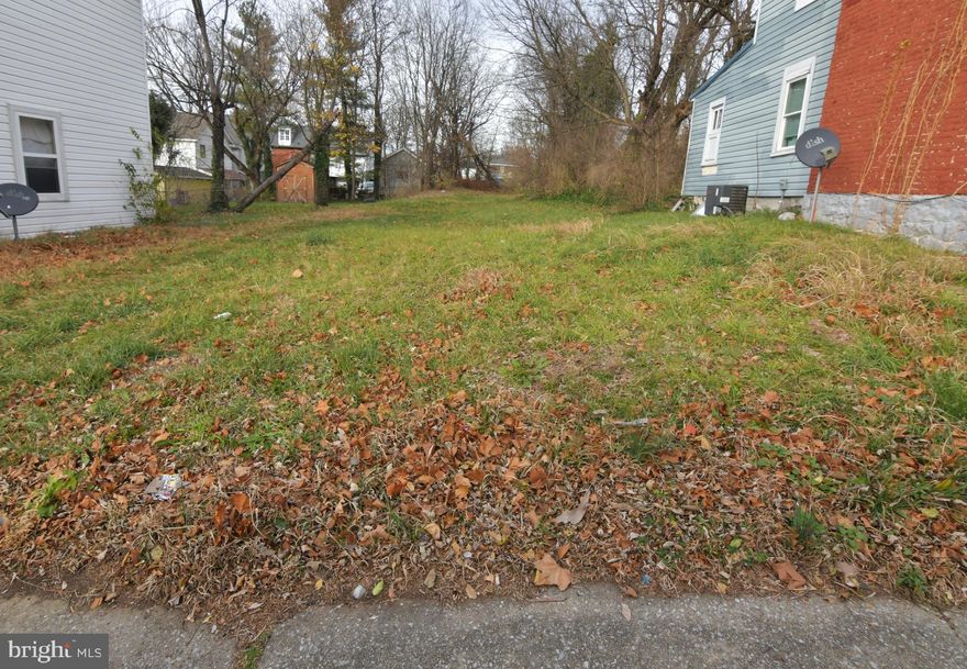 EASILY AFFORDABLE! Near downtown Martinsburg and convenient to I-81. Lot size 0.26 acre. Sold strictly as-is, where is. Cash preferred. Buyer to verify water and sewer availability and whether lot is suitable for buyer's intended use.  May be subject to tap fees. Also, may be subject to new impact fees for houses, multi-famlly and mobile homes that  must be paid before a building permit is issued.  The Eastern Panhandle is one of the fastest growing areas of West Virginia.  Residents of Martinsburg and Berkeley County are attracted to the small-town atmosphere, employment opportunities, restaurants, shopping, services, medical facilities,  a revitalizing downtown, and access to major roads, the MARC train and Amtrack. Lot size approximate.