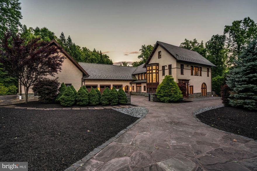 Discover unparalleled luxury in this custom-built corner lot home, nestled within the exclusive Merry-Go-Round community. This magnificent residence boasts an array of exceptional features, including 6 bedrooms, 7 full baths, and 2 half baths.

Upon entry you’ll find a grand living room, a dining room, a versatile home office or guest room, a light filled family room, a chef’s kitchen, a butler pantry, two powder rooms, and a sun-room. The entire main floor of the home overlooks the stunning resort style saltwater pool.

This home’s primary bedroom suite is what dreams are made of. It features wall sconces, a balcony overlooking the pool, and a fireplace. The primary bathroom features dual closets, heated floors, TVs in the mirrors, dual water closets, a rainfall shower, and a spa-like tub.

The largest closet is a heaven of sophistication and organization. Step inside this expansive space, which will transform your wardrobe as if it were a boutique. Adorned with glass closets so you can easily see your entire wardrobe. A central island is perfect for housing your jewelry and accessories. It's a luxurious and well-designed sanctuary that exudes elegance and functionality.

Each bedroom in the home features its own full bathroom including the lofted bedroom on the top floor of the home. The foyer of the home features hidden storage behind wall panels for your convenience.

Revel in the convenience of garage parking for 5 luxury cars as well as a stunning flagstone motor court.

The basement is an entertainer's paradise, featuring a large recreation room with wet bar, a full guest suite, a state-of-the-art movie theater that seats 8 with motorized recliners, and an indoor heated Endless Pool with an automatic retractable cover and a brand-new liner.

The home’s backyard is a masterpiece designed for hosting, featuring a gourmet kitchen equipped with a Viking natural gas grill by the pool, a saltwater pool, and an extraordinary hot tub that accommodates up to 15 people. Whether you choose to swim in the indoor or outdoor pool, you can relax afterward in the soothing steam sauna. If that wasn’t enough, the entire home is outfitted with personal balconies and outdoor space perfect for entertaining.

Enjoy low-maintenance outdoor living with Synlawn synthetic grass installed on the patio and surrounding the pool area. Inside, the home boasts upgraded heated Rehau radiant floors in the family room, primary bedroom closets, primary bath, primary bedroom, kitchen, and loft bathroom. Experience the wow factor with hidden TVs embedded in the mirrors of the primary closets and the basement entertainment center. The home also includes five brand-new A/C units, new thermostats, with a SEER 16 compressor unit for the loft. A whole house generator also conveys with the property for maximum convenience.

Merry-Go-Round Farm spans 204 scenic acres, offering breathtaking views of the Potomac River. This unique community, with only 81 homesites divided into five sections, features homes averaging three-quarters of an acre, perfectly integrated into a meticulously preserved natural setting. The common grounds include an equestrian center with two well-maintained stables, ample pasture, miles of forest trails for hiking and riding, three small lakes, tennis courts and several expansive fields ideal for picnics in warm weather and cross-country skiing or sledding in winter. Onsite groundskeepers and barn staff care for the land and horses under the direction of a Homeowners' Association, of which all residents are members.