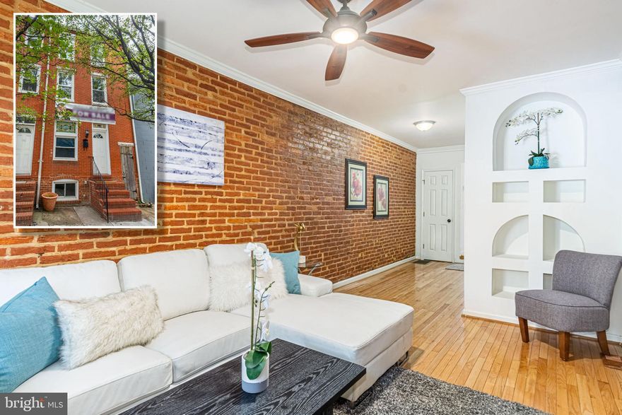 PICTURESQUE MOVE IN READY FELLS POINT ROWHOME WITH OVER 1,700 SQ. FT. OF LIVING SPACE AND A ROOFTOP DECK!  Features include gleaming hardwood floors throughout the main level, an inviting living room with exposed brick and crown molding, main level half bath, Galley kitchen  with ss appliances, tons of natural light, and space for a table, 2nd level with 2 bedrooms and 1 full bath, 3rd level Primary bedroom with vaulted ceilings and a full bath with whirpool tub and separate glass enclosed shower, a rear patio, and a rooftop deck with sweeping views!  Pack your bags and move right in!