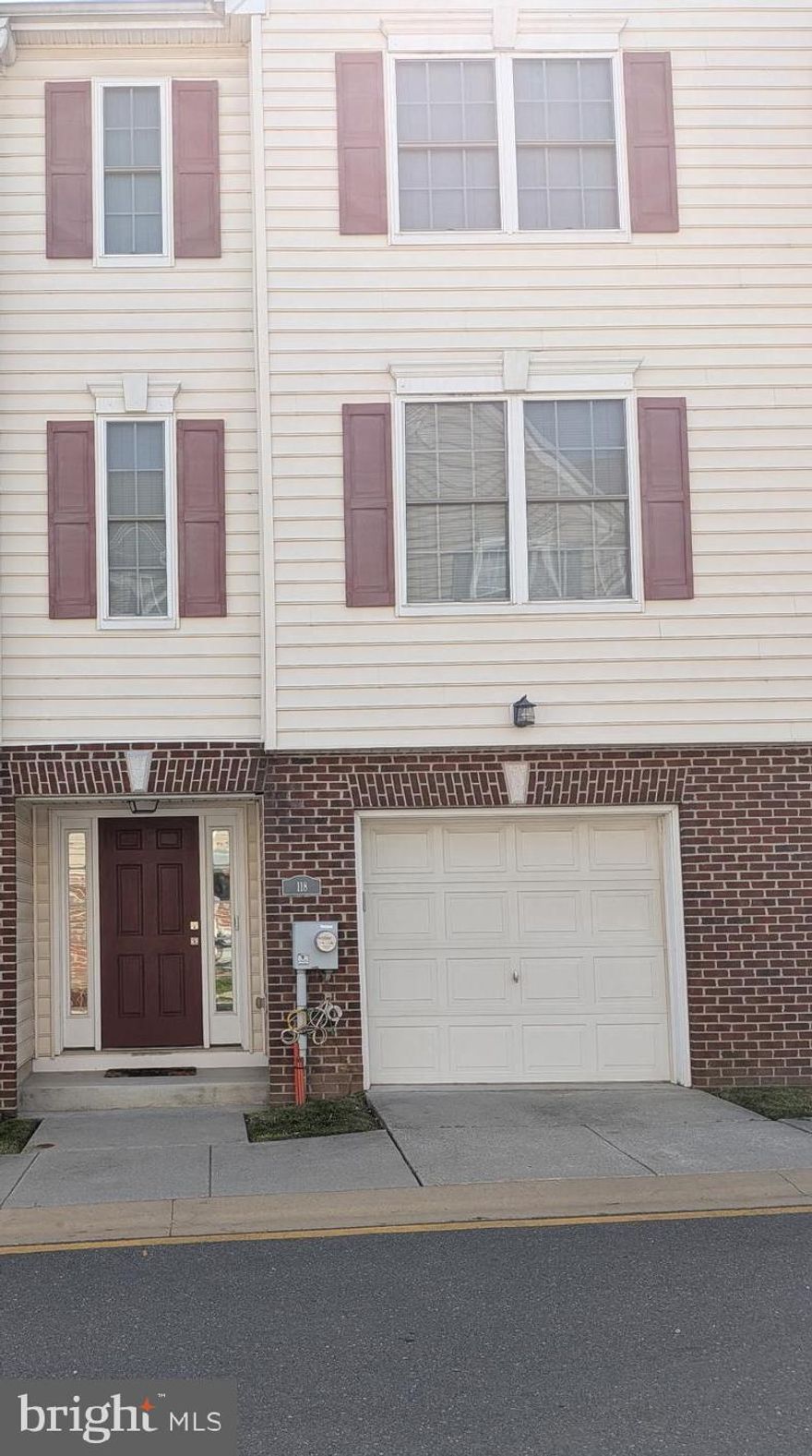 New Price and new opportunity to make this house your new home!!  Welcome to 118 McMullen Circle, this is the home you have been waiting for. A  beautifully updated home offering comfort, space, and convenience.
As you enter, you’re greeted by a spacious foyer on the main level. This level also features a versatile finished room, currently used as a family room and workout space—perfect for adapting to your lifestyle needs.  Upstairs, a wide and light-filled staircase leads to the main living area. The open-concept living and dining room creates an inviting atmosphere, ideal for entertaining family and friends. The generously sized kitchen boasts ample cabinet and counter space, along with room for a casual dining set. Recent updates include new LVP flooring and carpet in the bedrooms, modern light fixtures, a newer dishwasher and range (both less than one year old), and a programmable thermostat for added efficiency.  The bedrooms are cozy yet spacious, providing comfortable retreats. The primary bedroom features a walk-in closet and an en-suite bathroom with plenty of space.  Enjoy the convenience of a new library within walking distance (opening soon), along with nearby restaurants, grocery stores, and shopping options. There are 2 parking areas for overflow parking.  Commuters will appreciate the easy access to I-495 and I-95.  Don’t miss this opportunity—schedule your tour today!